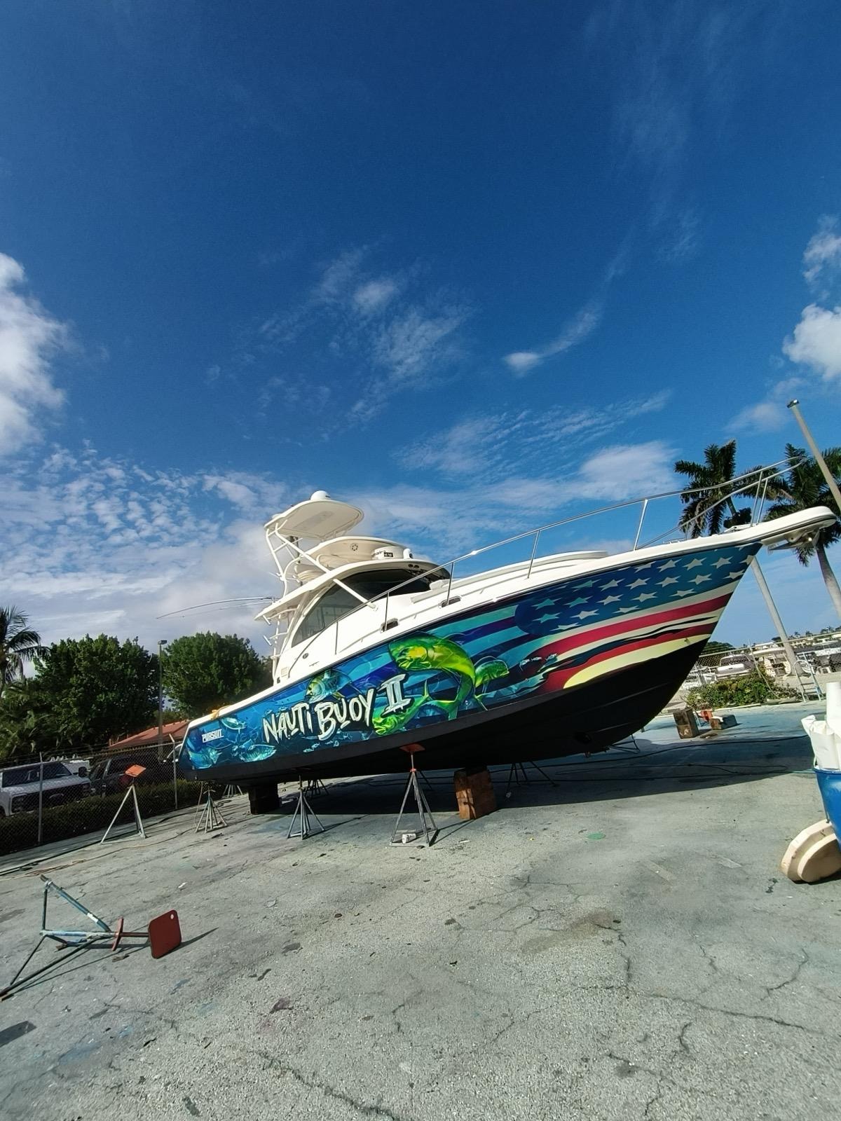 Custom boat wrap with American flag and marine graphics