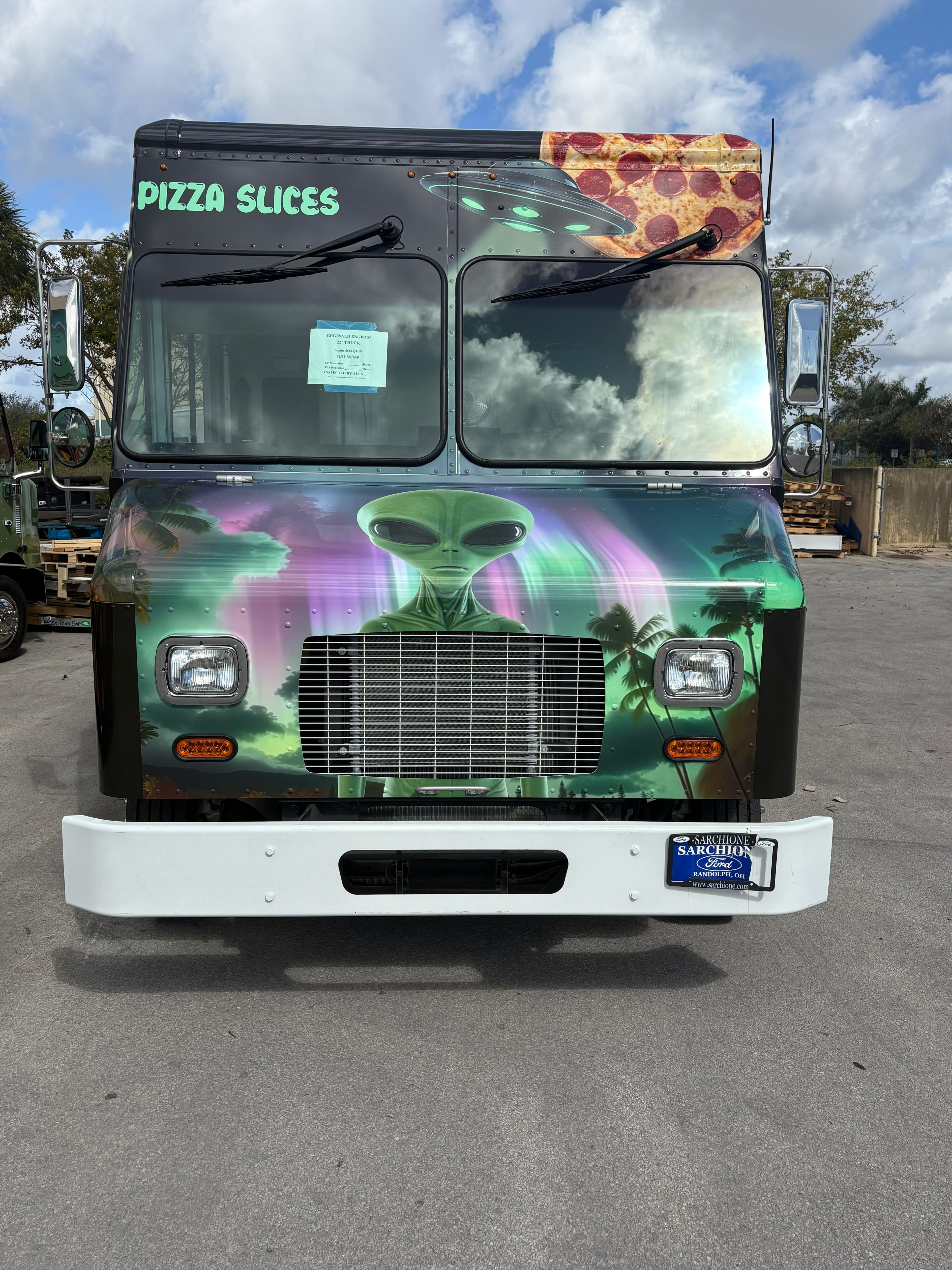 Pizza Slices food truck with custom alien-themed wrap